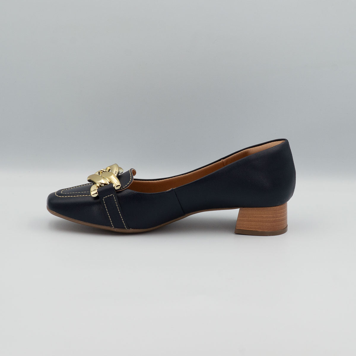 Coentro buckle pump - left side profile view showing stacked low block heel