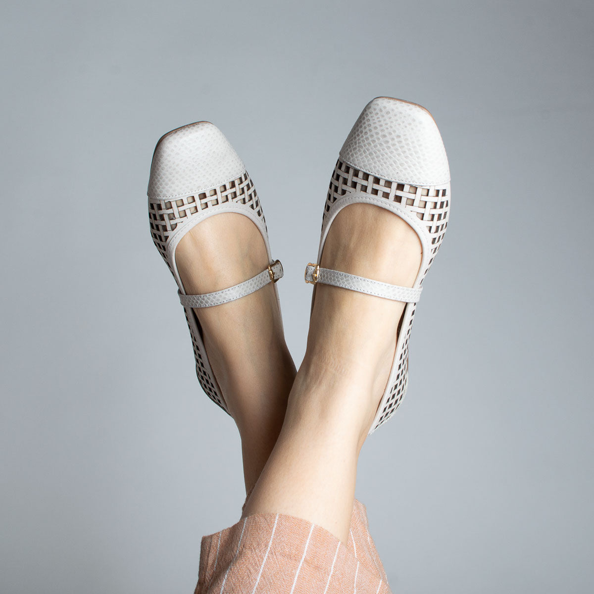 Woman wearing vegetal off-white Açaí flats - lifestyle view