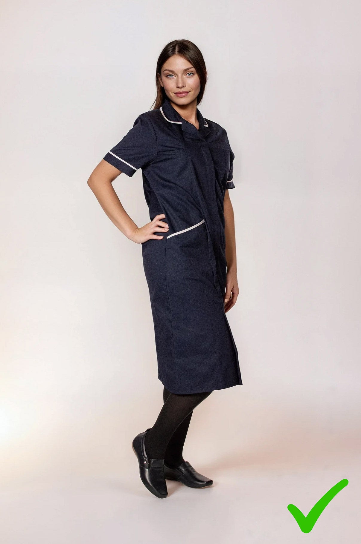 Choose Terraloom comfortable shoes - navy uniform dress with black tights and professional footwear