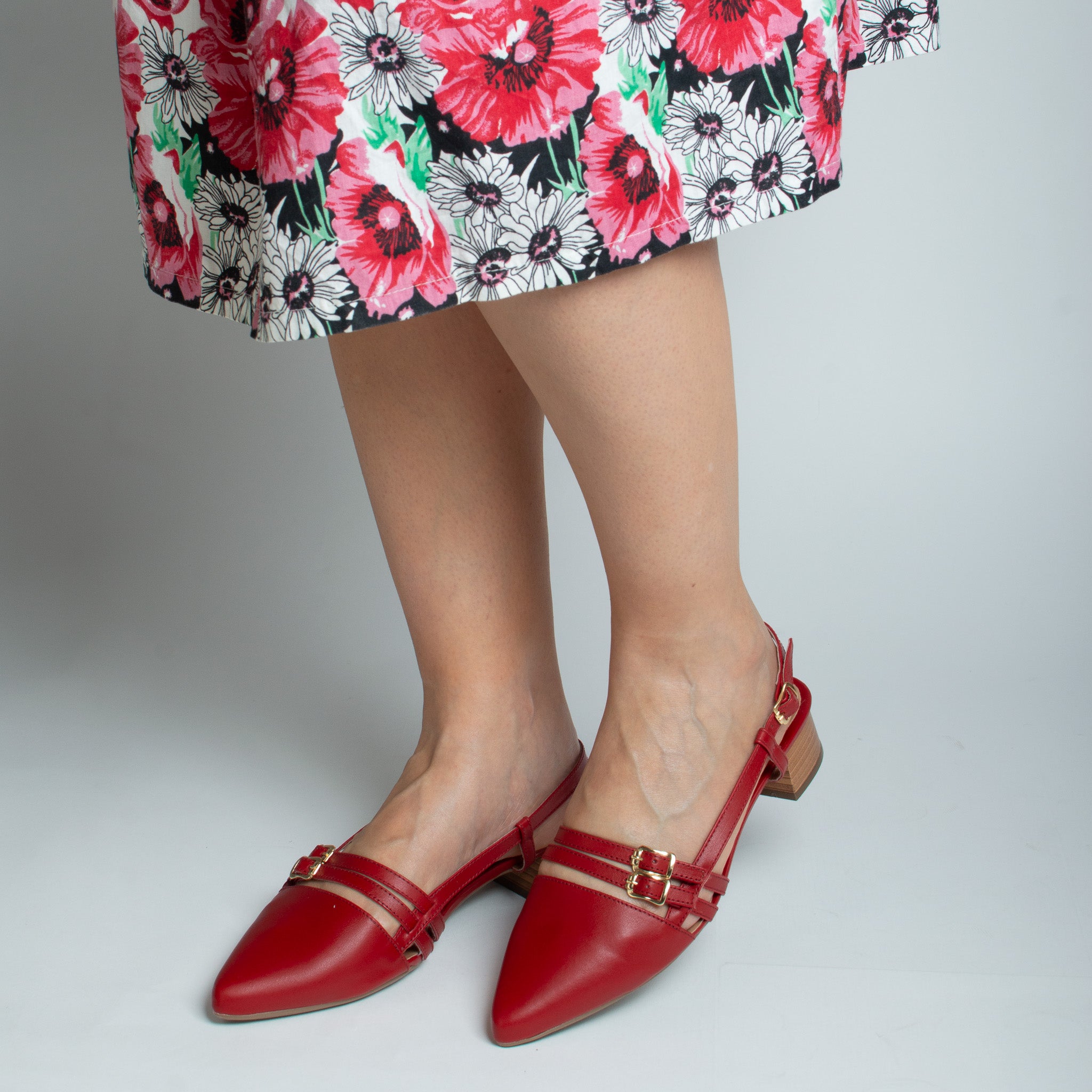 Woman wearing Acerola pumps with floral dress - lifestyle view