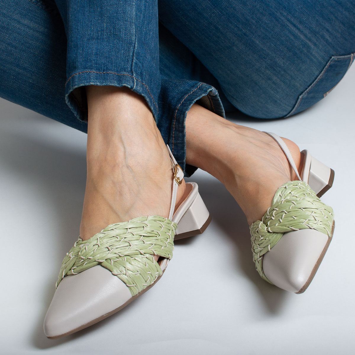 Woman wearing Cajá pumps with navy trousers - lifestyle view