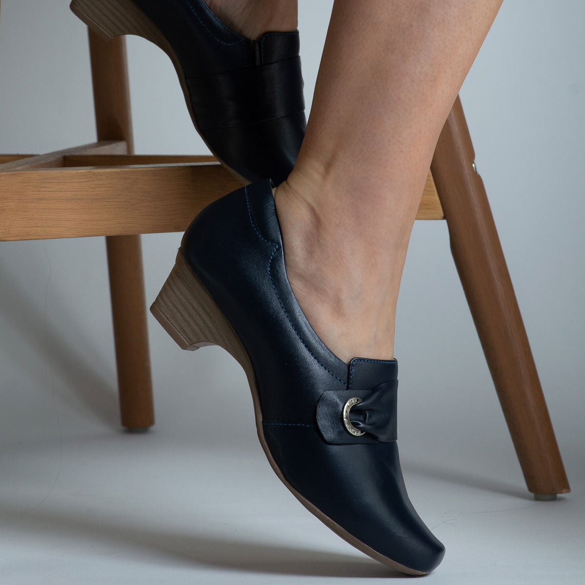 Woman wearing Andiroba shoes with navy trousers - lifestyle view