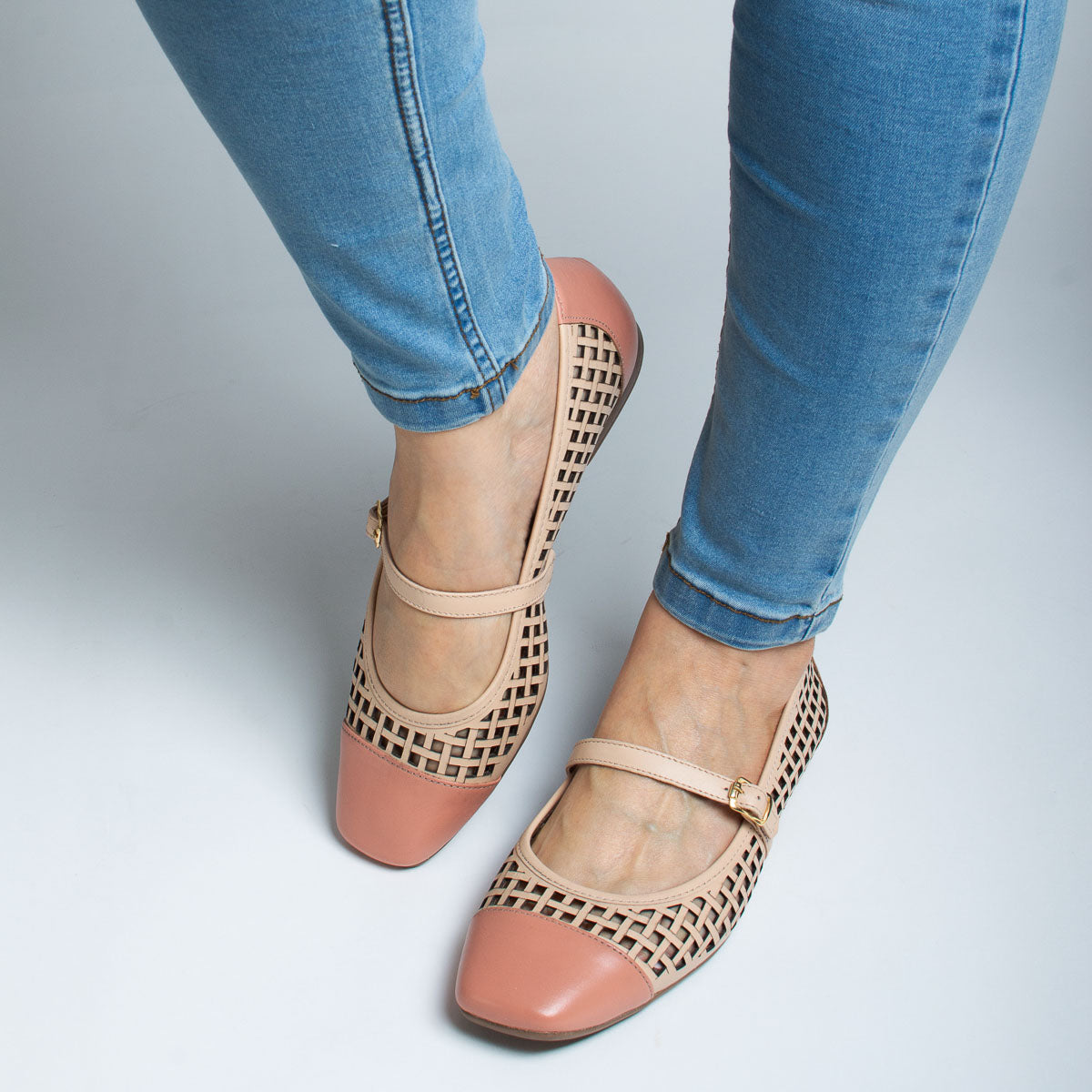 Woman wearing Açaí flats with light blue jeans - lifestyle view