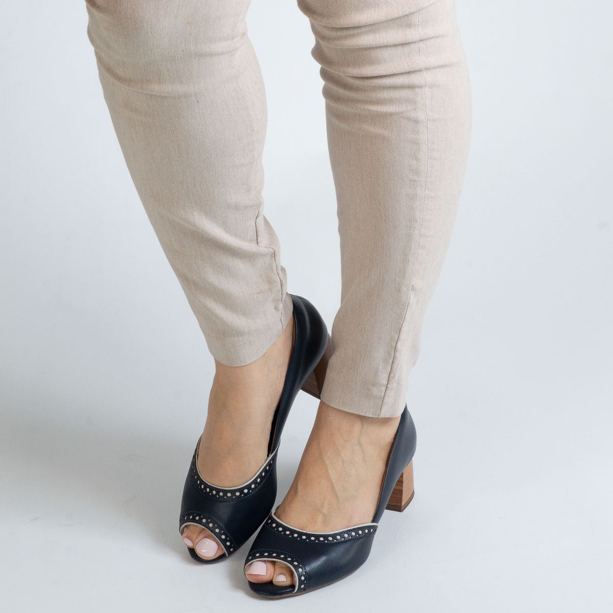 Woman wearing vegetal deep sea blue Urucum pumps - lifestyle view