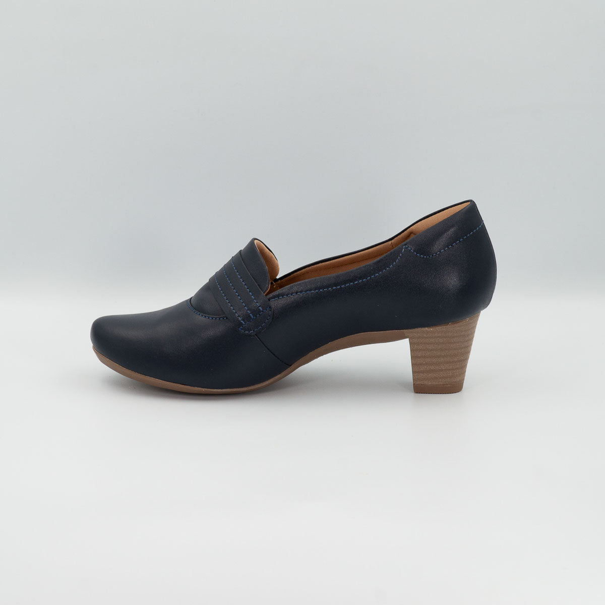 Canela clinical comfort shoe - left side profile view showing stacked mid block heel