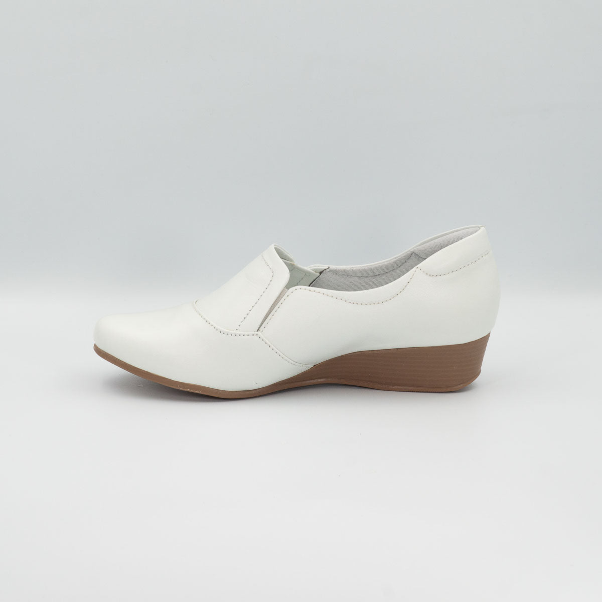 Castanheira clinical comfort shoe - left side profile view showing stacked low wedge heel