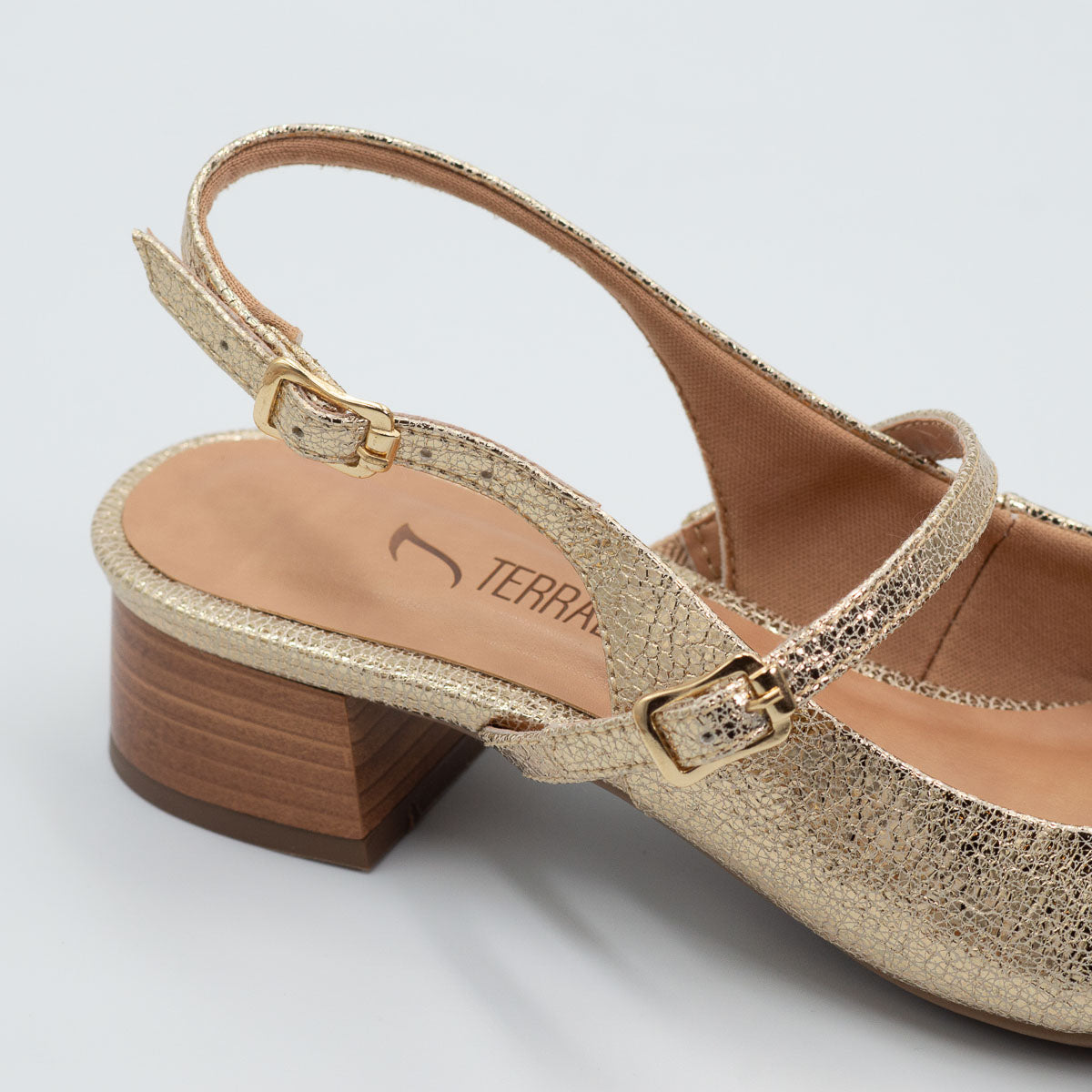 Terraloom Pequi pump - close-up detail view crackle light gold metallic leather