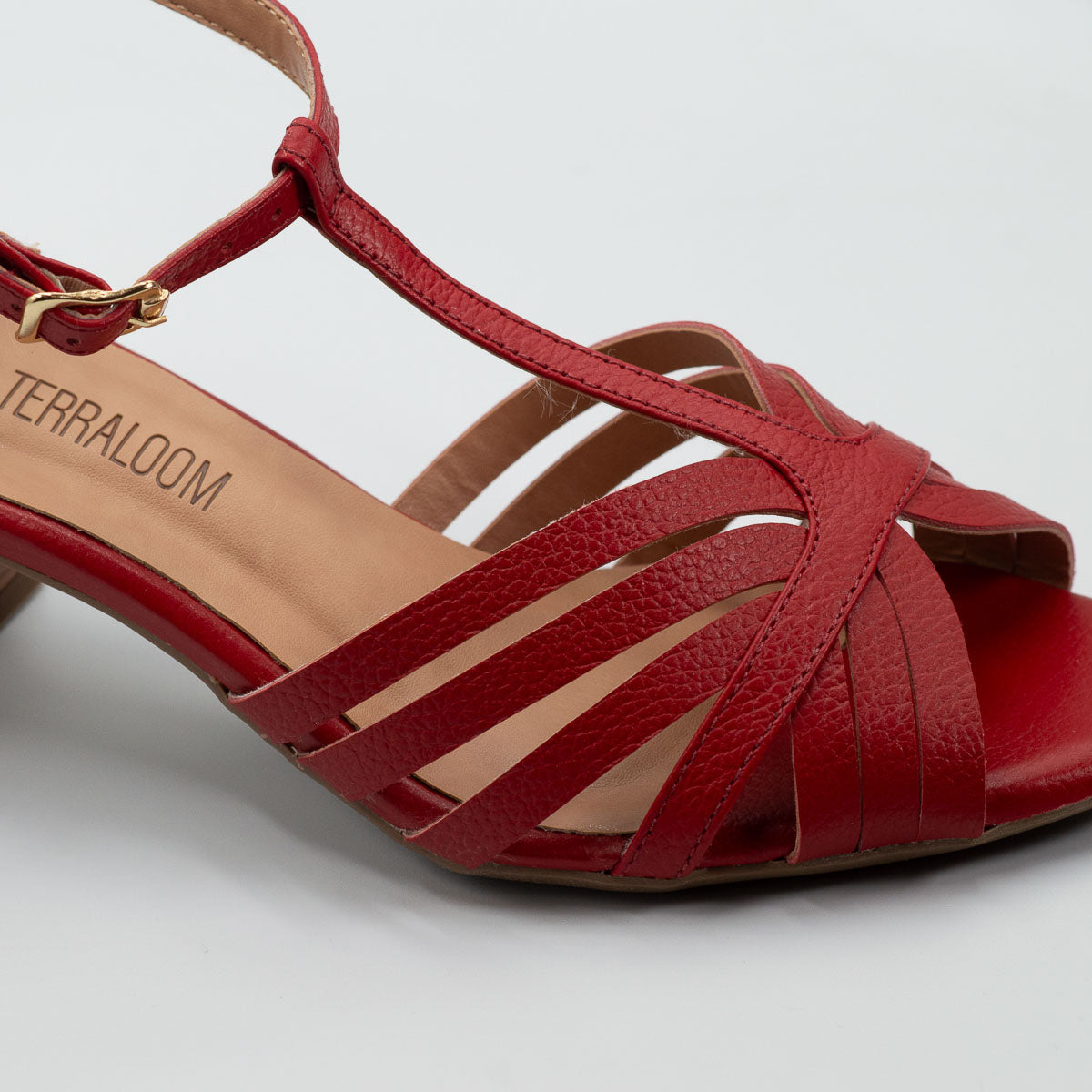 Terraloom Girassol sandal - close-up detail view floater pomegranate leather