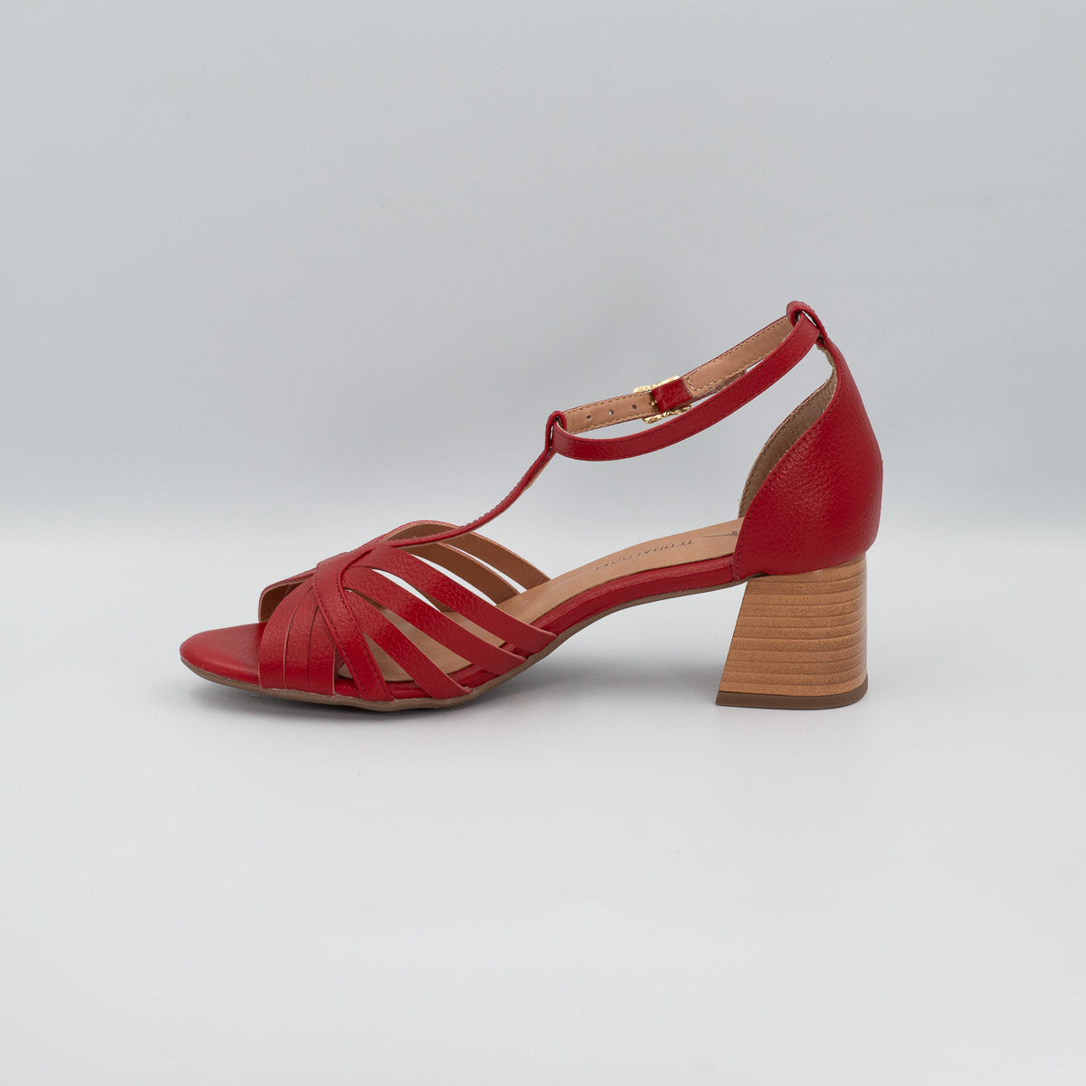 Girassol T-bar sandal - left side profile view showing stacked heel