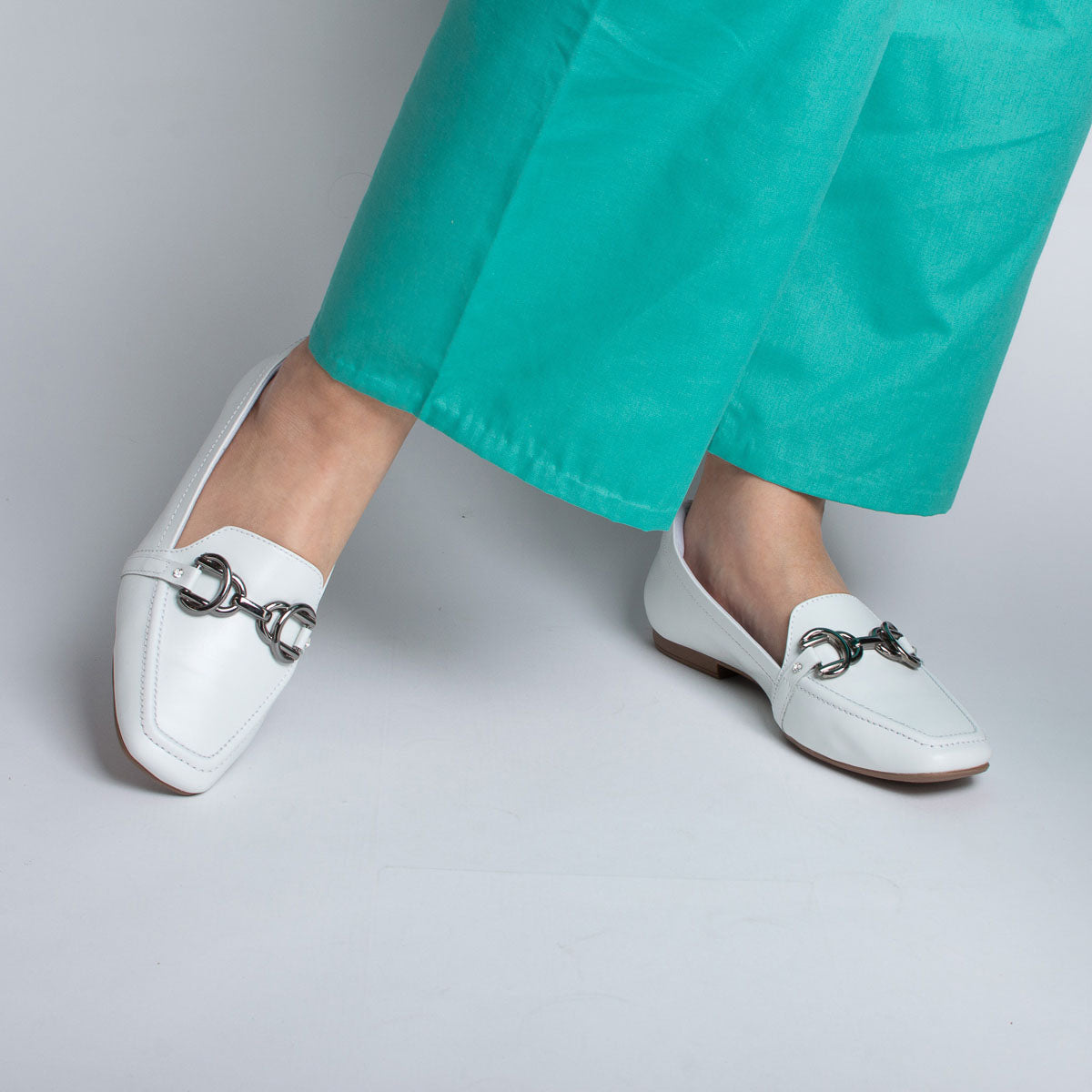 Woman wearing Mogno shoes with teal scrubs - lifestyle view