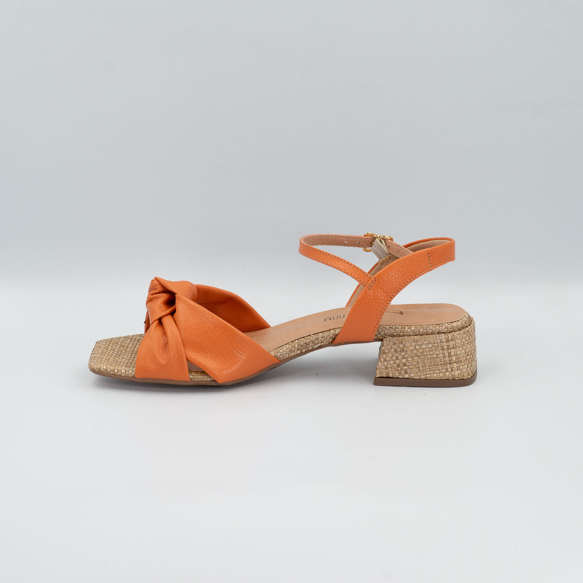 Lírio ankle strap sandal - left side profile view showing low block heel