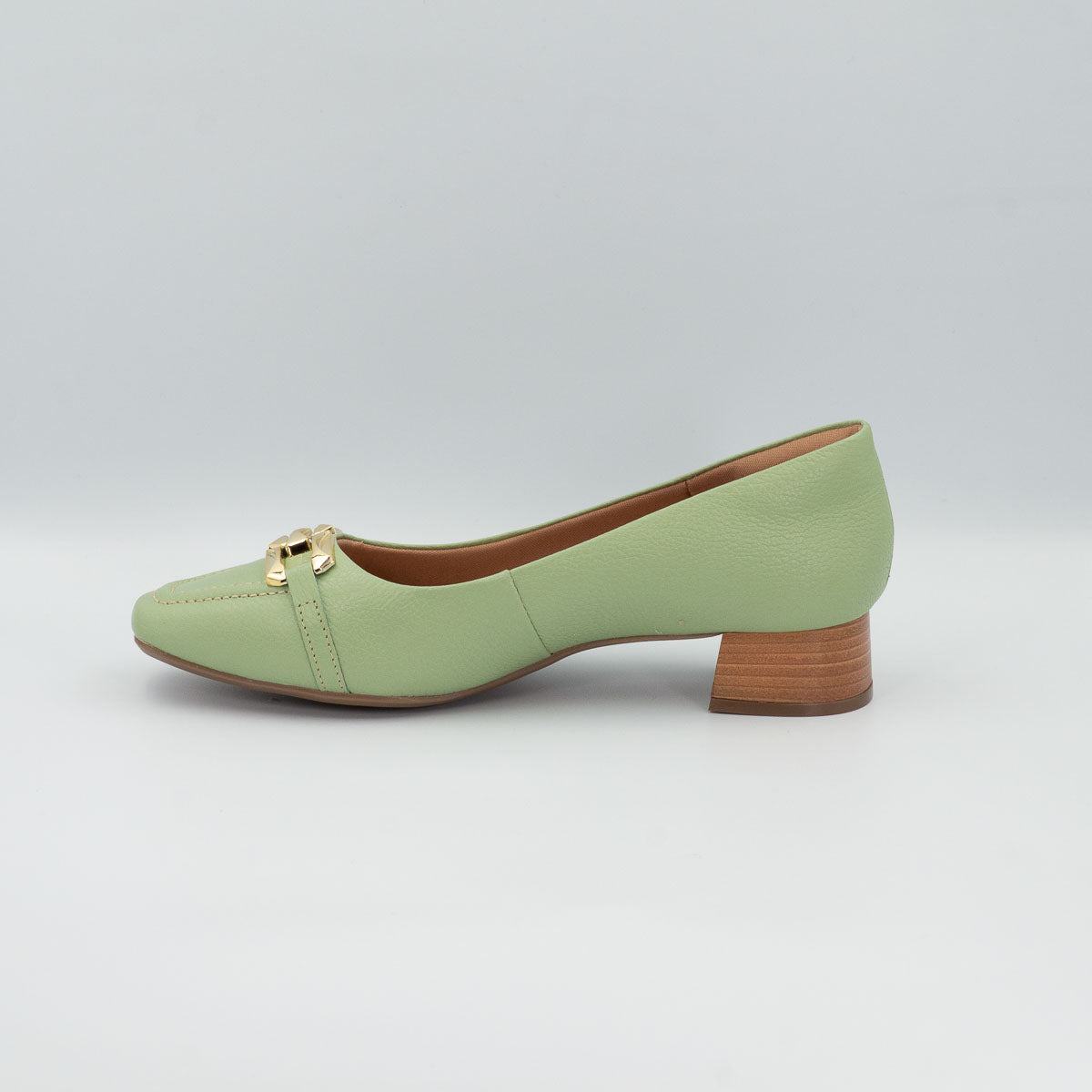 Manjericão buckle pump - left side profile view showing stacked low block heel