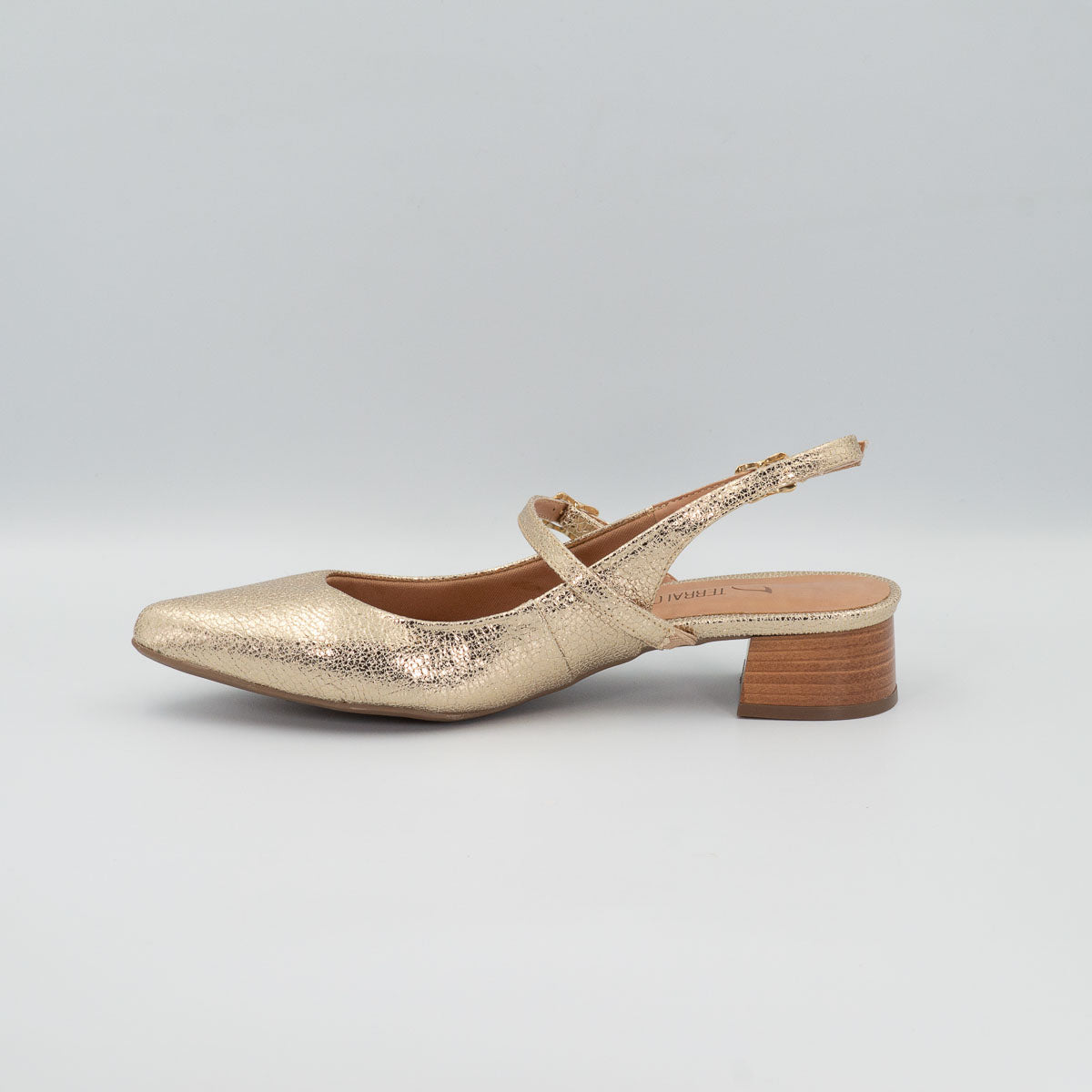 Pequi metallic slingback pump - left side profile view showing stacked low block heel