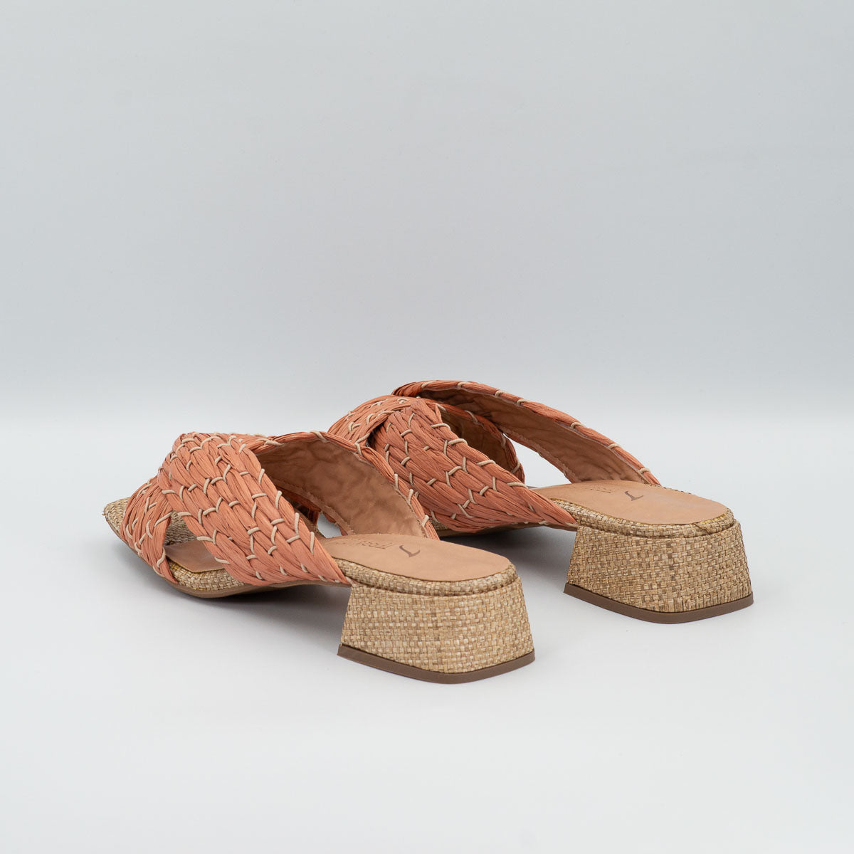 Terraloom Rosa braided sandals - three-quarter view coral peach from behind