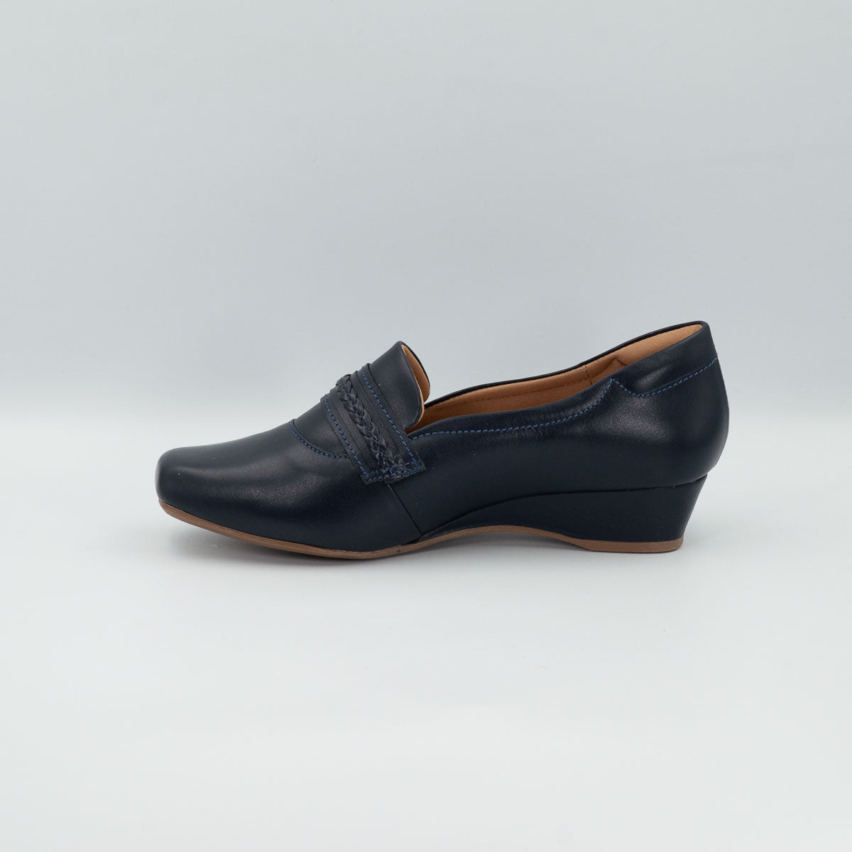 Sapucaia clinical comfort shoe - left side profile view showing low wedge heel