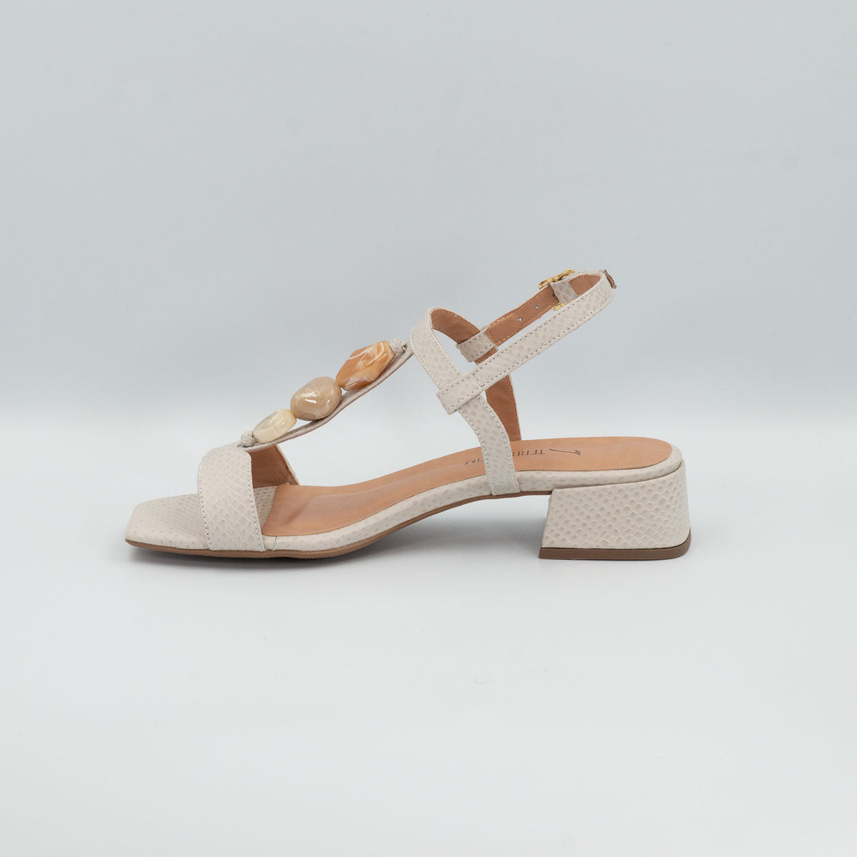 Violeta ankle strap sandal - left side profile view showing low block heel